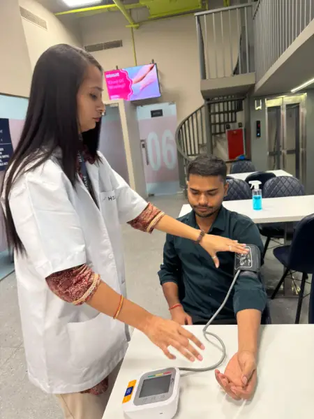 Healic Clinic Staff - measuring patient BP
